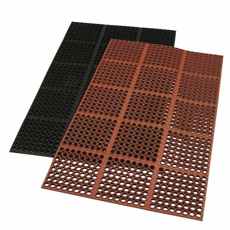 Red Dura Chef 7/8 Inch Anti Fatigue Kitchen Mat Layered On Top of a Black Dura Chef