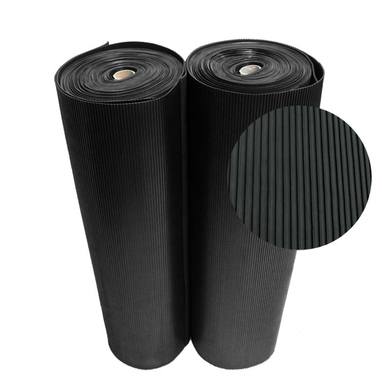 Two Vertical Rolls of Black Corrugated Ramp-Cleat