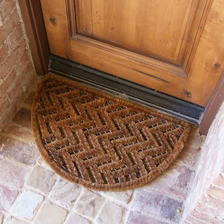 Caspian Sea Coir Entrance Door Mat Close Up on Brick Entrance