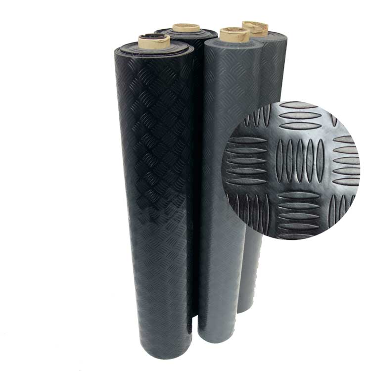 Four Vertically Standing Rolls of Diamond Grip Rolled PVC Matting with a Close Up Textured View Four Vertically Standing Rolls of Diamond Grip Rolled PVC Matting with a Close Up Textured View