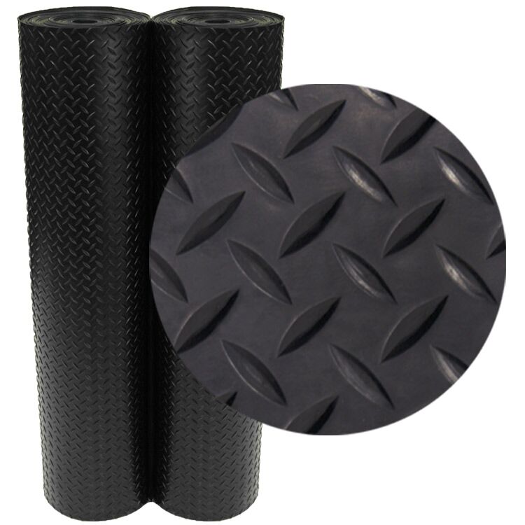 Two Vertically Standing Rolls of Black Diamond Plate Roll Rubber Matting with a Close Up Textured View Two Vertically Standing Rolls of Black Diamond Plate Roll Rubber Matting with a Close Up Textured View